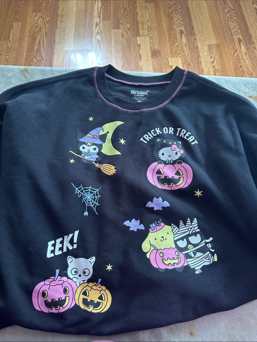 Hello Kitty Black Halloween Graphic Sweatshirt with Pastel Accents